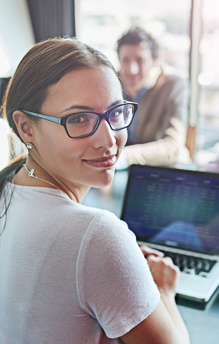 A female office worker at a meeting