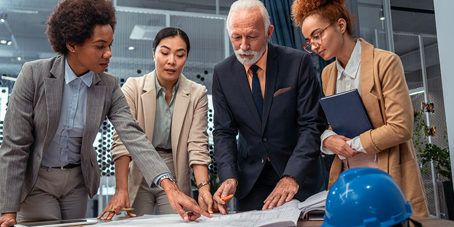 Engineering leader explaining plans to clients.