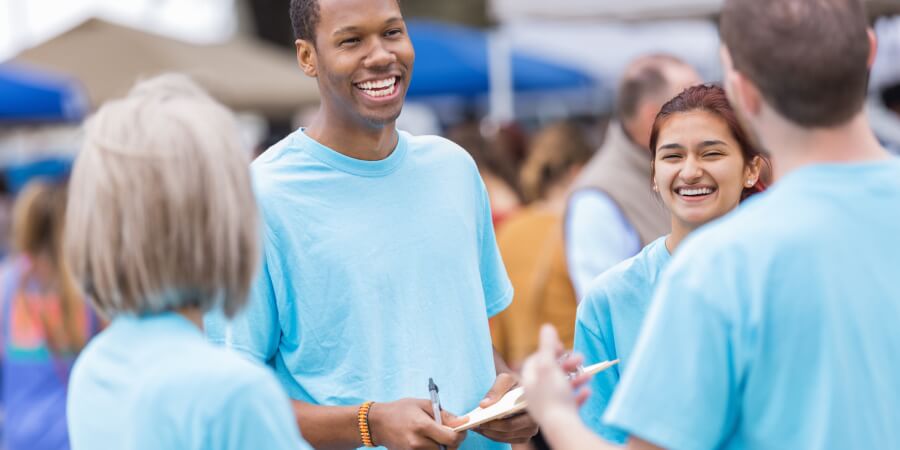 a group of health students discussing health in the community