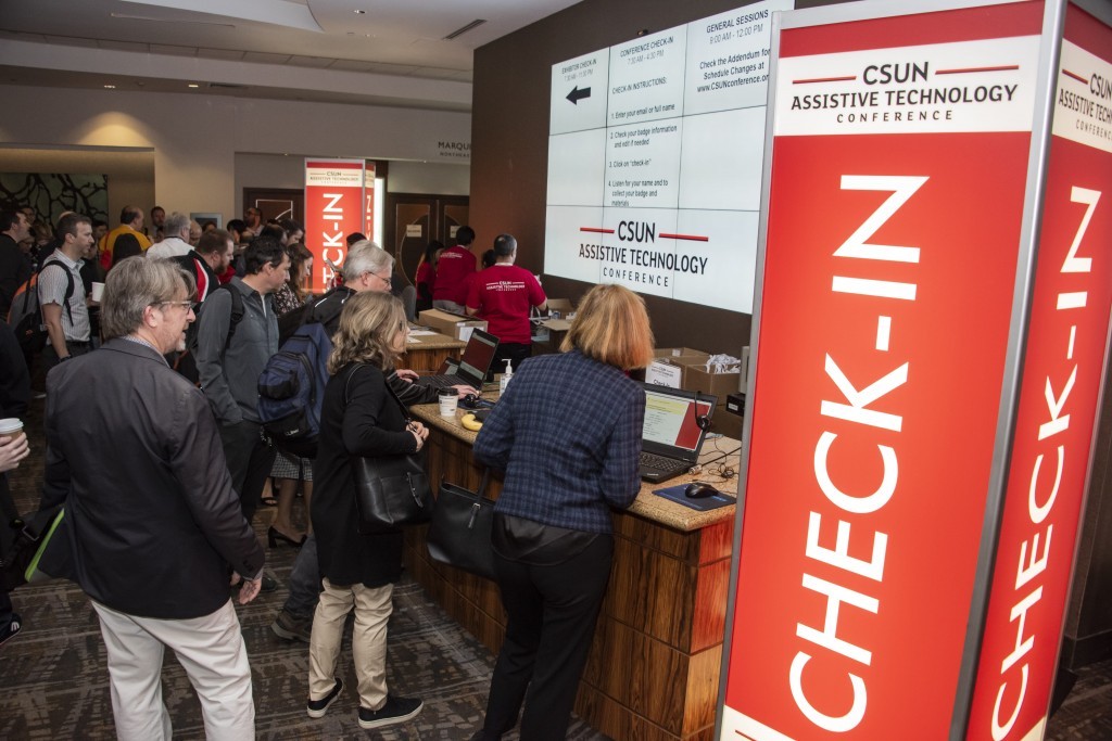 Attendees check in at CSUN’s Assistive Technology Conference.