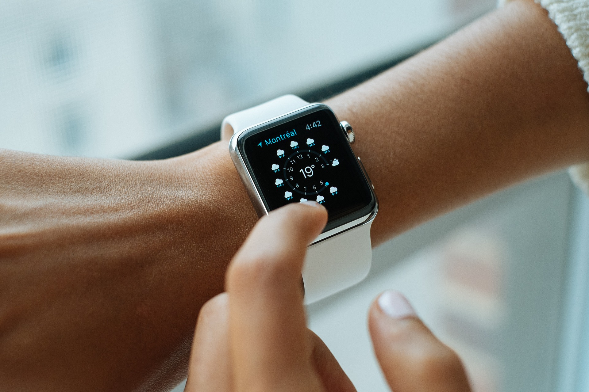 Close-up view of someone using an Apple smart watch