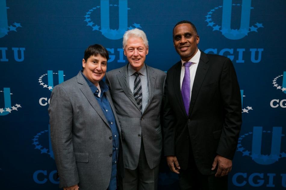CSUN Professor Mary-Pat Stein, left, with President Bill Clinton, center, and another CGI-U guest. Photo courtesy of the Clinton Foundation. Professor Mary-Pat Stein with President Bill Clinton and another CGI-U guest standing in front of the CGI-U sign.