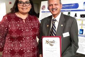 Dean S.K. Ramesh with an Environmental Sustainability Award.