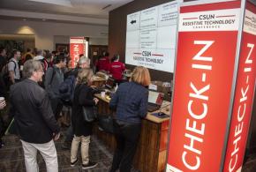 Attendees check in at CSUN’s Assistive Technology Conference.
