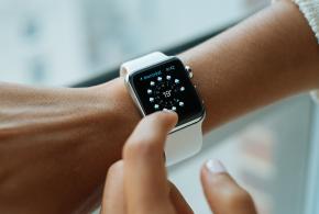 Close-up view of someone using an Apple smart watch